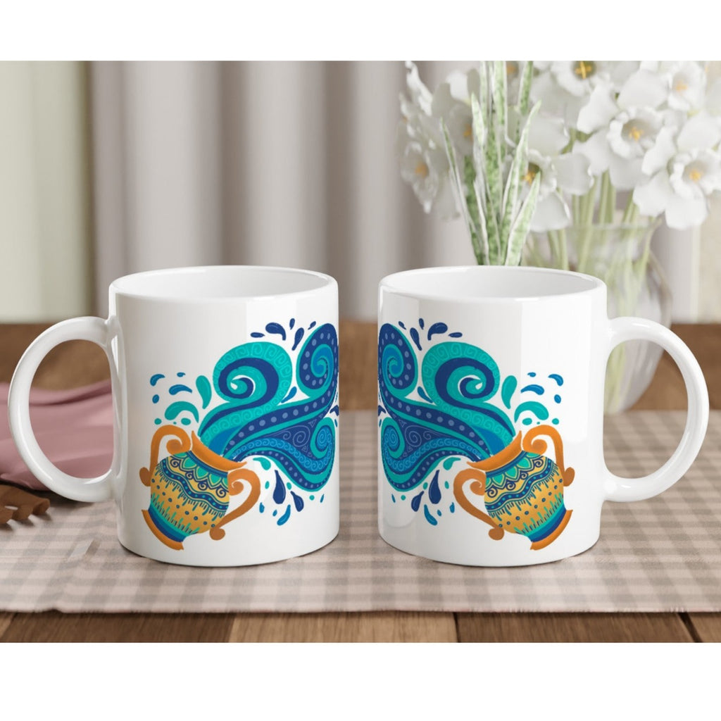 Image of two coffee white coffee mugs with Aquarius Sign designed by AK Pattern Studio 